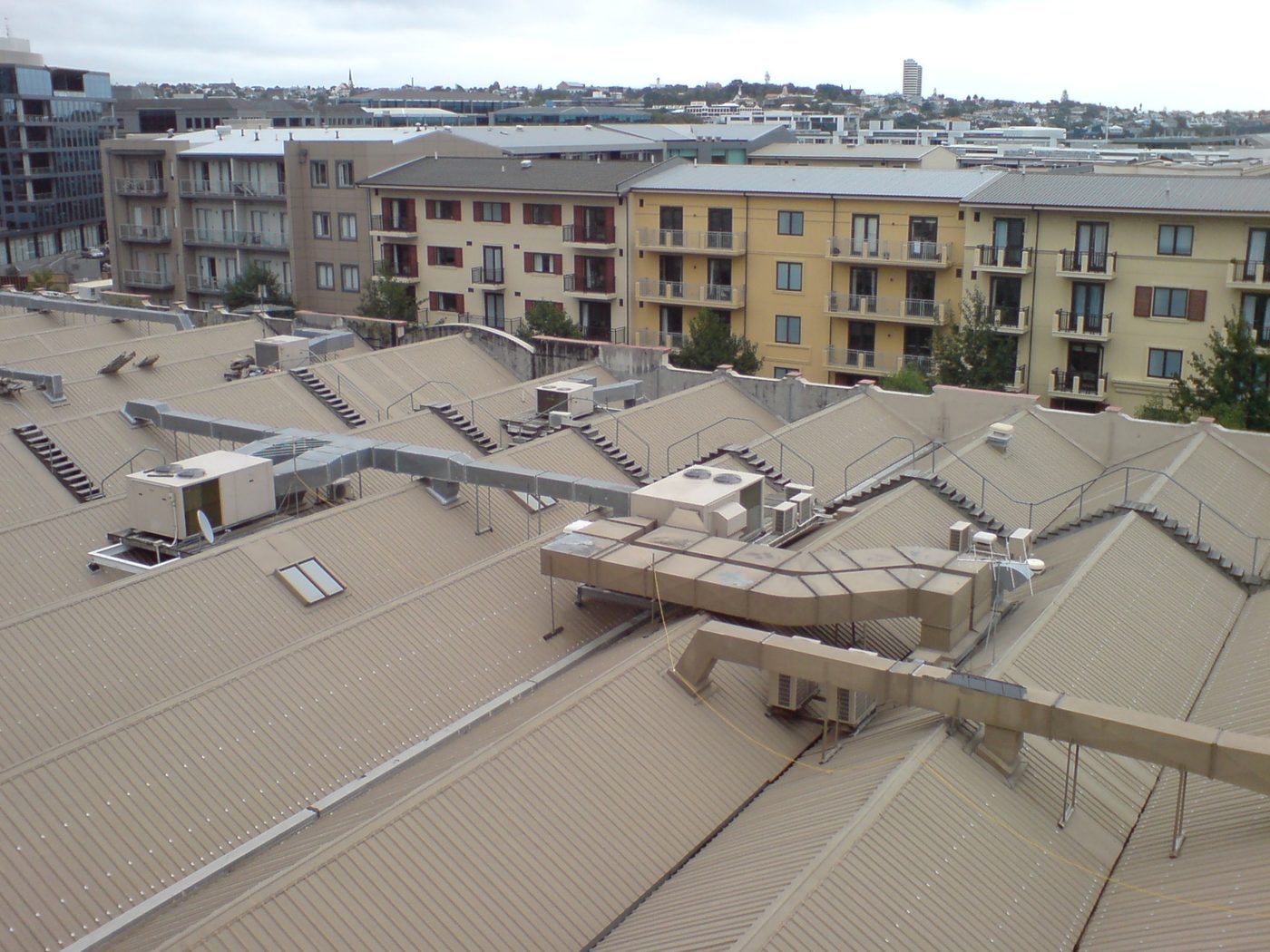 Commercial flat roof with rooftop plant on a warehouse in London, Ontario
